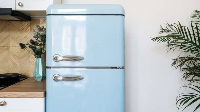 Retro blue refrigerator in a kitchen