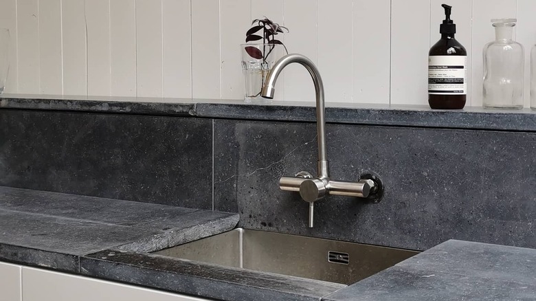 close up of bluestone countertop with sink