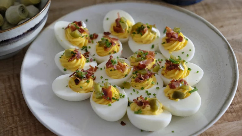 Bacon Jalapeno Deviled Eggs on white plate