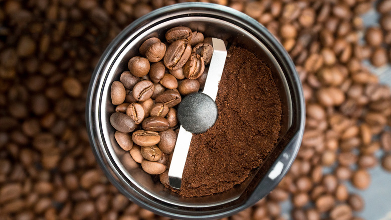 Coffee beans in grinder
