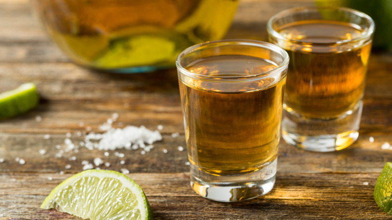 shots of reposado tequila with lime