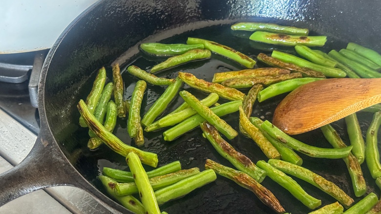 blistered beans in pan