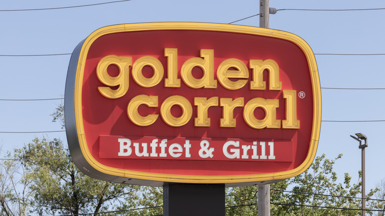 The exterior sign for the Golden Corral Buffet & Grill, as seen in daylight