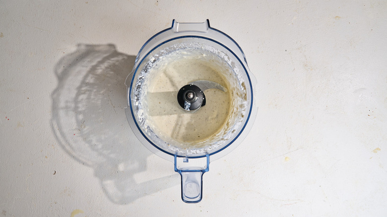 blue cheese ingredients blended together in a food processor