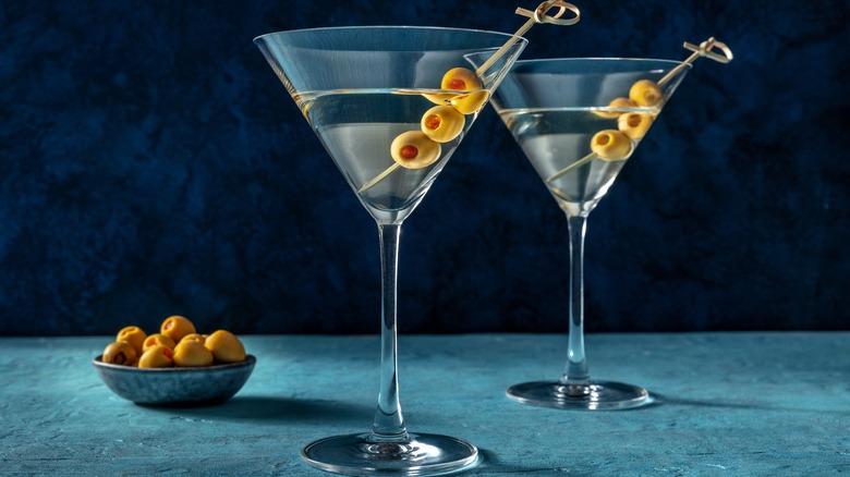 two dirty martinis with olives