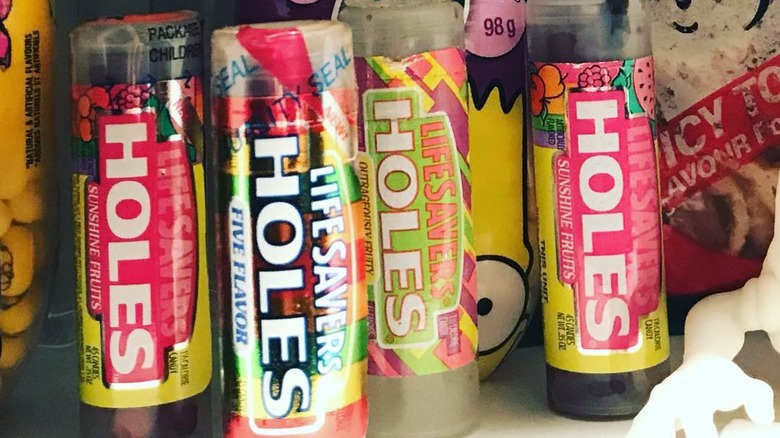 four cylinder of various Lifesavers Holes