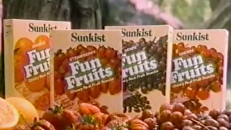 four flavors of Sunkist Fun Fruits and real fruit in commercial