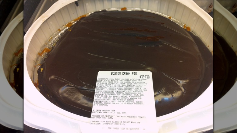 Kirkland Signature Boston Cream Pie from Costco inside white plastic package.