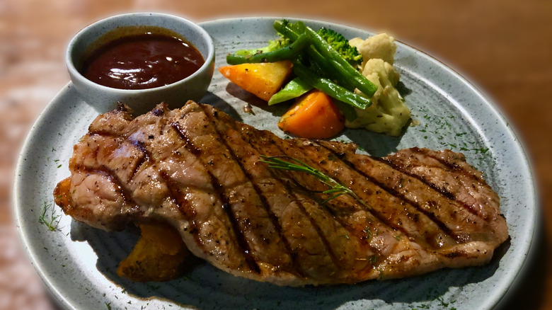 ribeye dinner with broccoli at restaurant