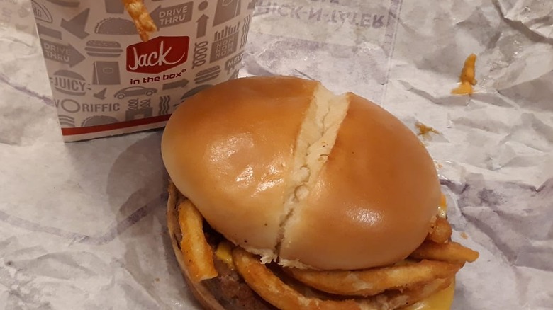 Jack in the Box sriracha curly fry burger on paper