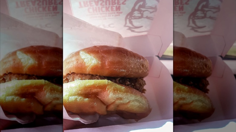 KFC cardboard product box with KFC donut chicken sandwich inside