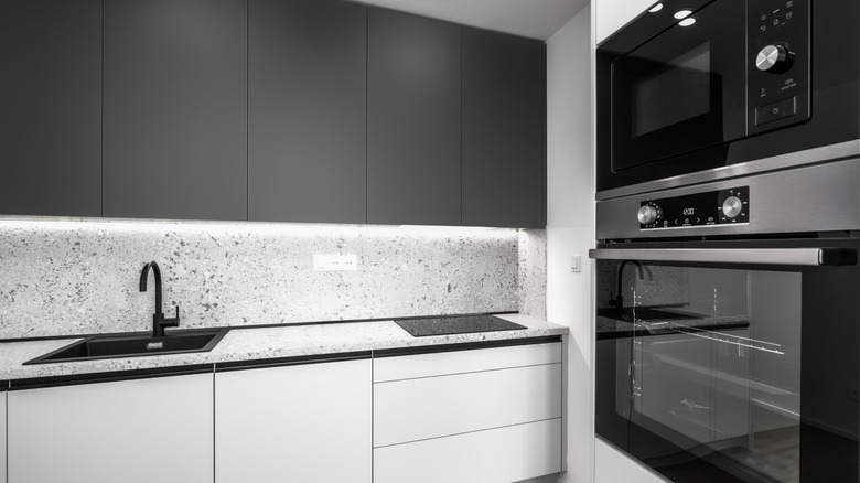 Terrazzo countertop in modern gray, white, and black kitchen