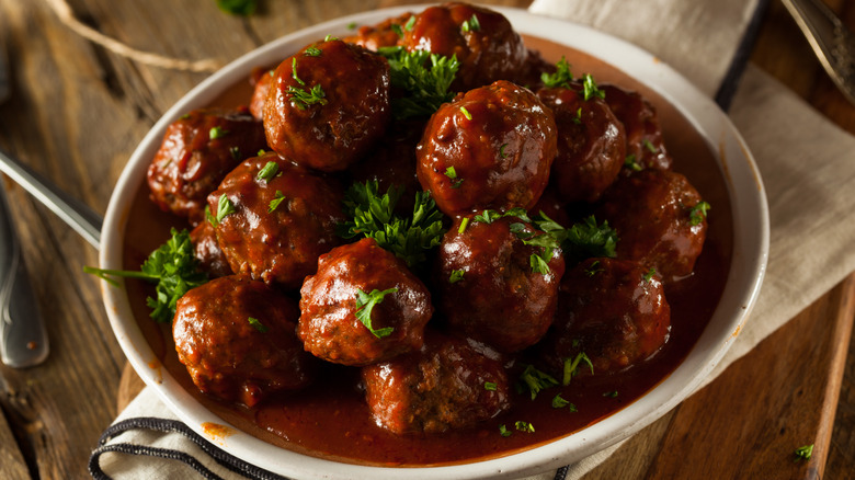 Overhead view of meatballs with barbecue sauce in a bowl