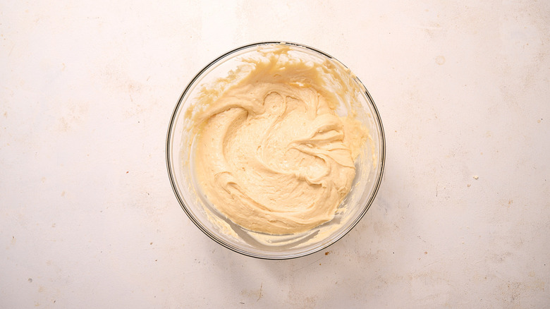 cake mix and yogurt combined in bowl