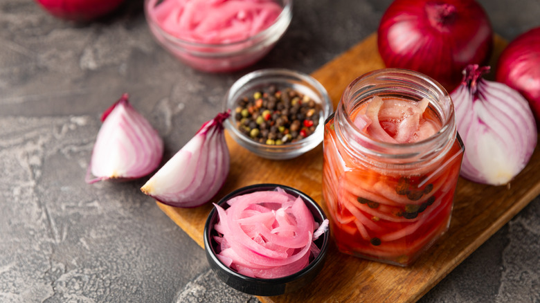 Pickled red onions in a jar