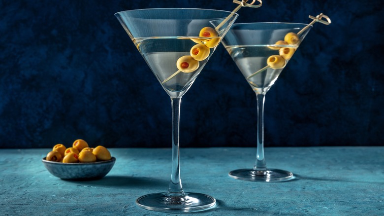 two martinis with olives