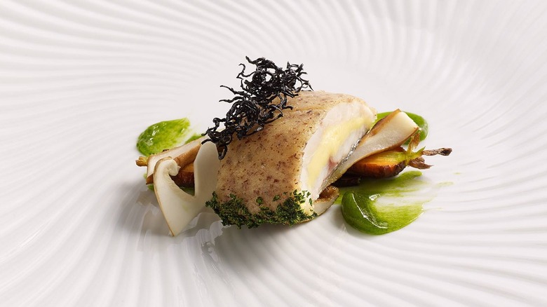 Seabass with black trumpet mushrooms and green sauce at Per Se