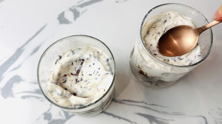 DIY blizzards being spooned into glasses