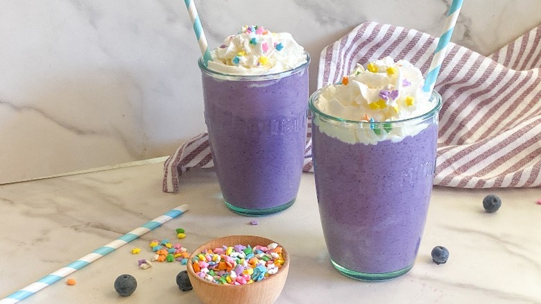 grimace shake in 2 glasses