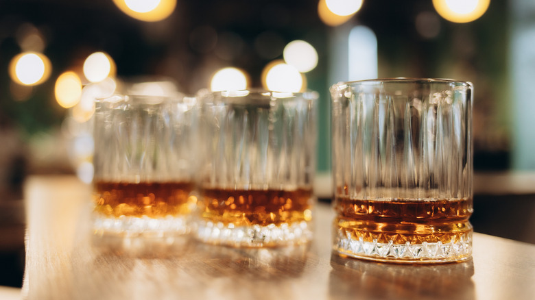 bourbon tasting glasses in a row