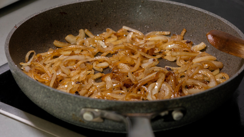 Onions caramelizing in a pan