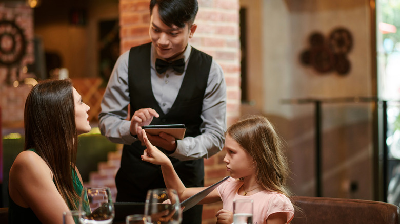 Server taking order at restaurant