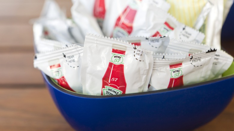 Bowl of ketchup condiment packets