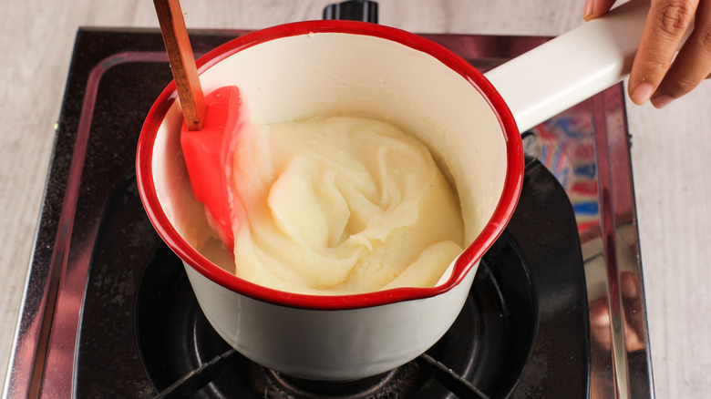 Instant mashed potatoes cooking in pot