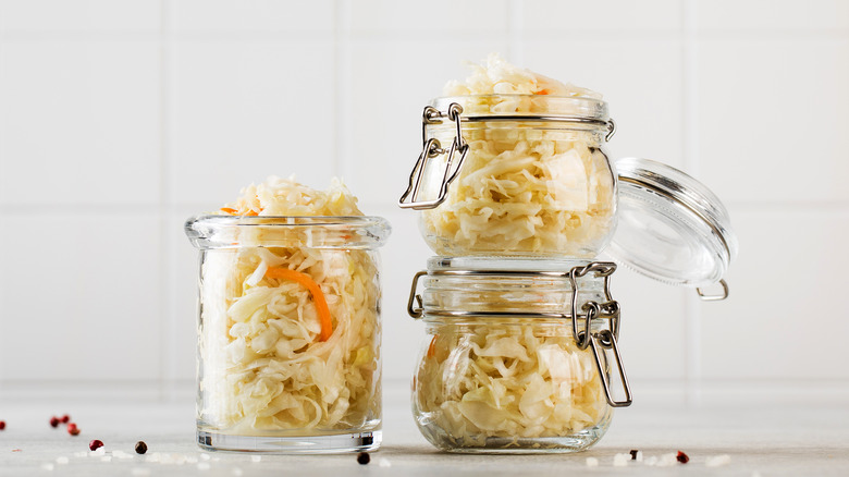 Sauerkraut in glass jars stacked