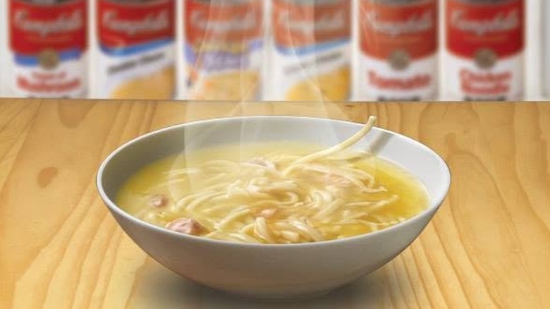 Campbell's chicken noodle soup in white bowl