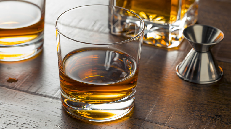 Close-up of a glass of bourbon neat