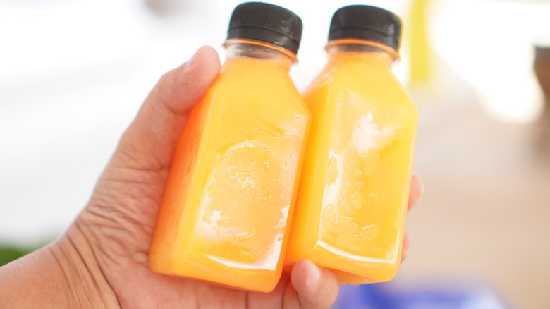 orange juice in plastic bottles