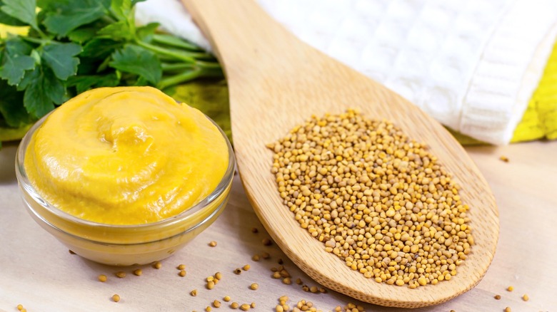 Pot of mustard with mustard seeds