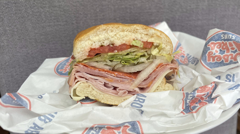 Half a Jersey Mike's Original Italian sub sandwich on paper