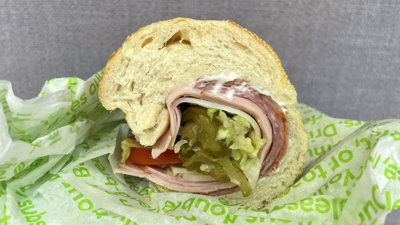Half a Publix Italian sub sandwich on paper