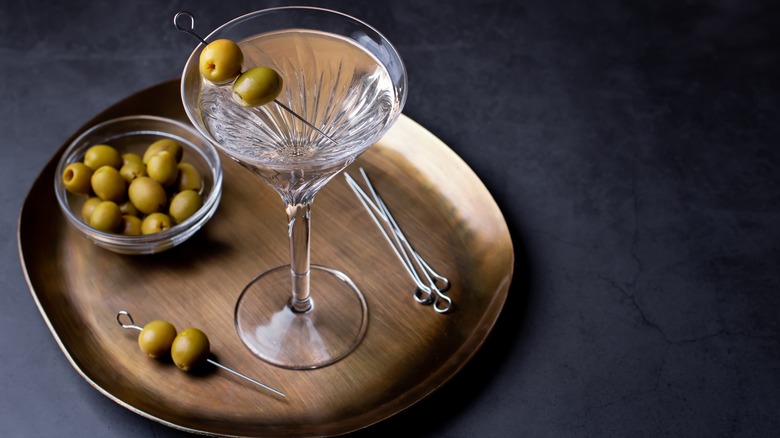 Martini with olives on tray