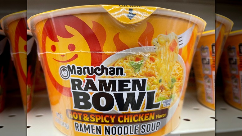 A close-up of the yellow-orange Maruchan ramen bowl.