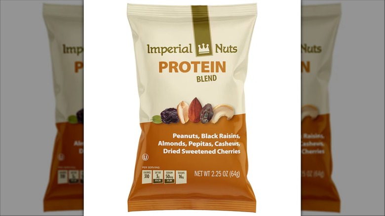 Beige pouch of Imperial Nuts Fruit and Nut Protein Blend on white background