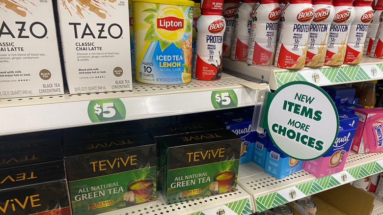 Shelves of different beverages at a Dollar Tree store