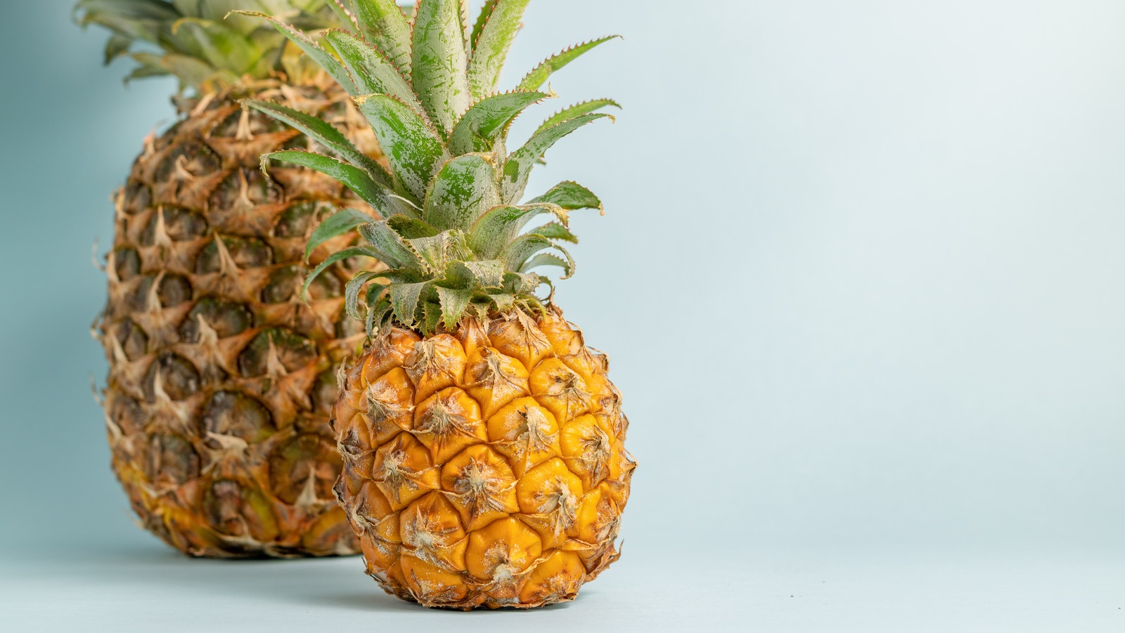 Don't Bother Cutting A Pineapple Unless You Flip It Upside Down First