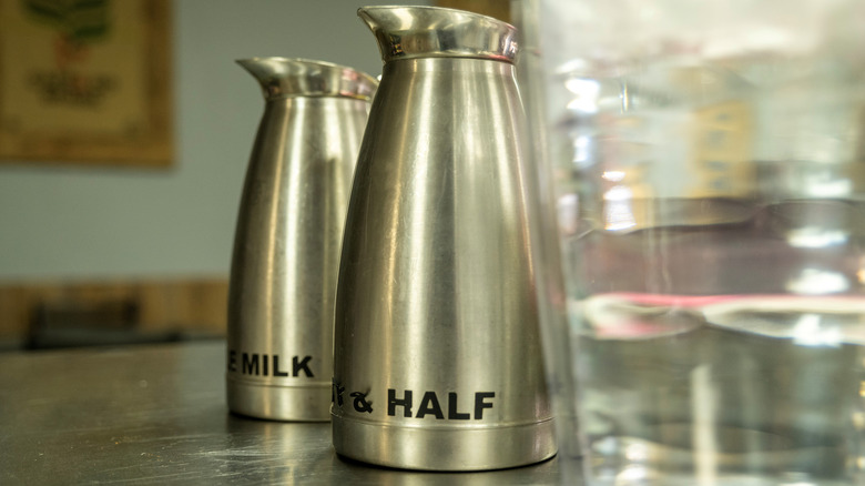 Milk pitcher in coffee shop