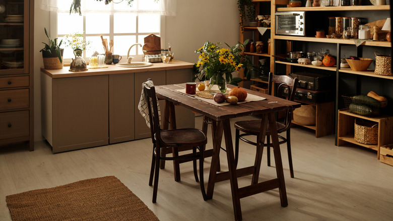 View of kitchen with freestanding furniture