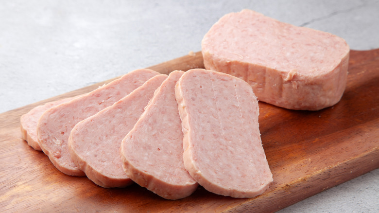Sliced spam on a chopping board