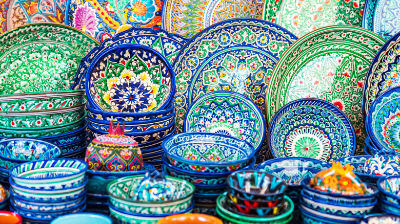 Stacks of assorted patterned dishes