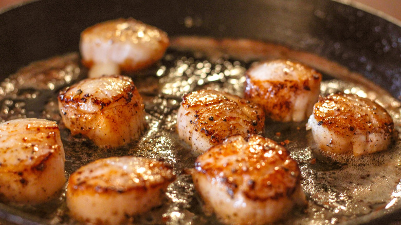 Don't Sear Scallops Without Adding This Flavor Bomb To The Pan