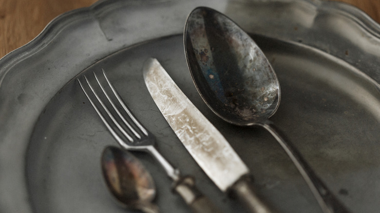 Antique, tarnished silver cutlery
