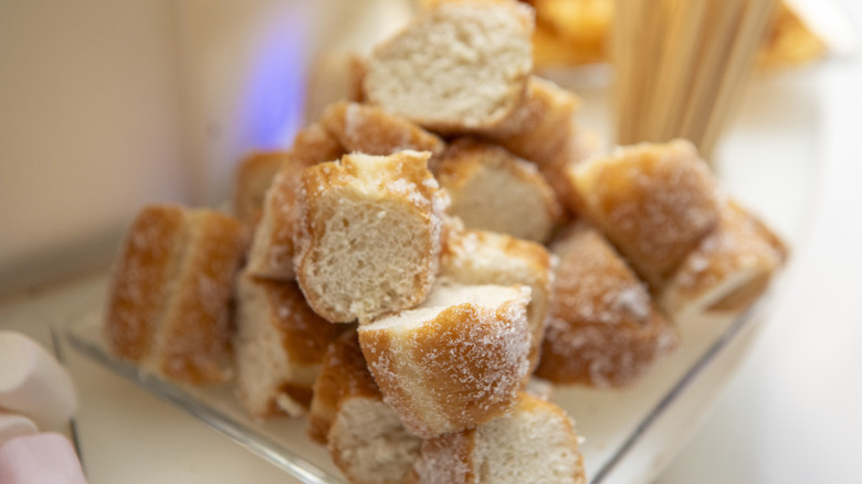 Chopped donut pieces on a plate