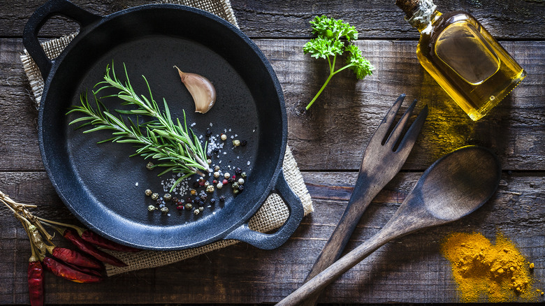 spices and herbs in skillet