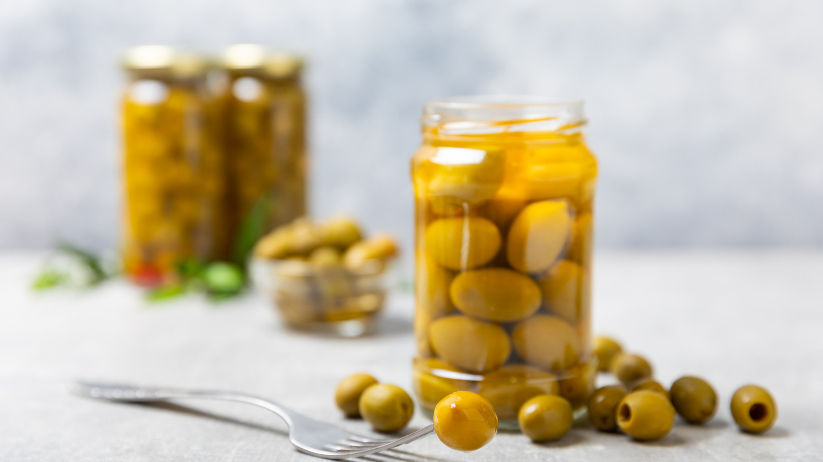 Don't Toss Leftover Olive Brine - Use It In Meat Dishes Instead - Tasting Table