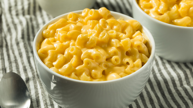 creamy macaroni and cheese in a porcelain bowl